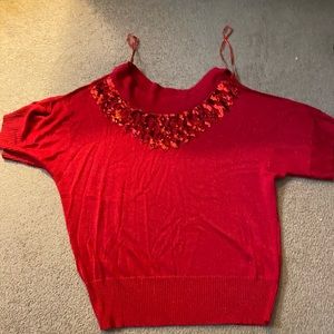 Joseph, size extra large ,red sequins top - there is a opening on the upper arms